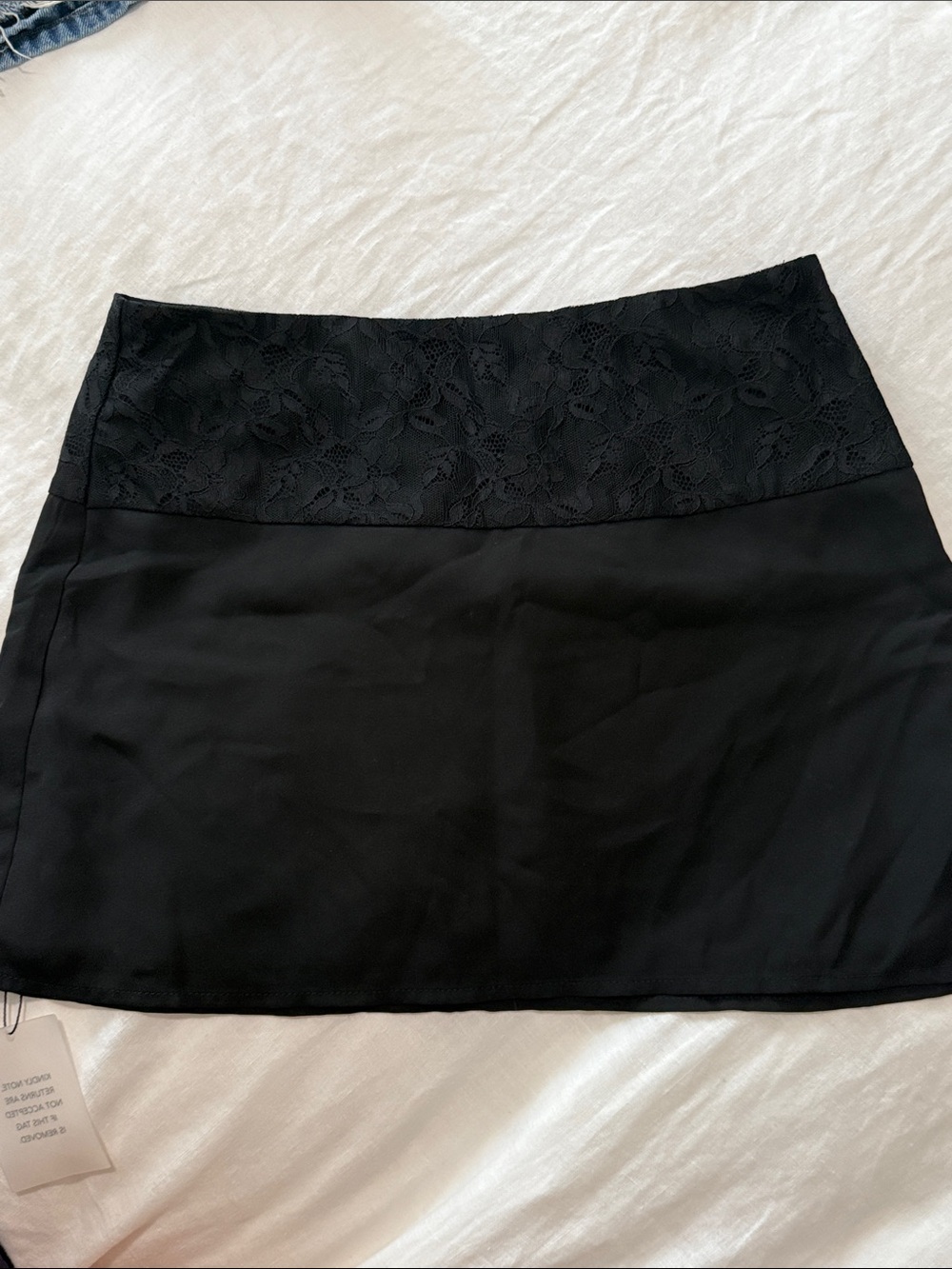 Revolve More to Come Black Mini Skirt and Top Set.